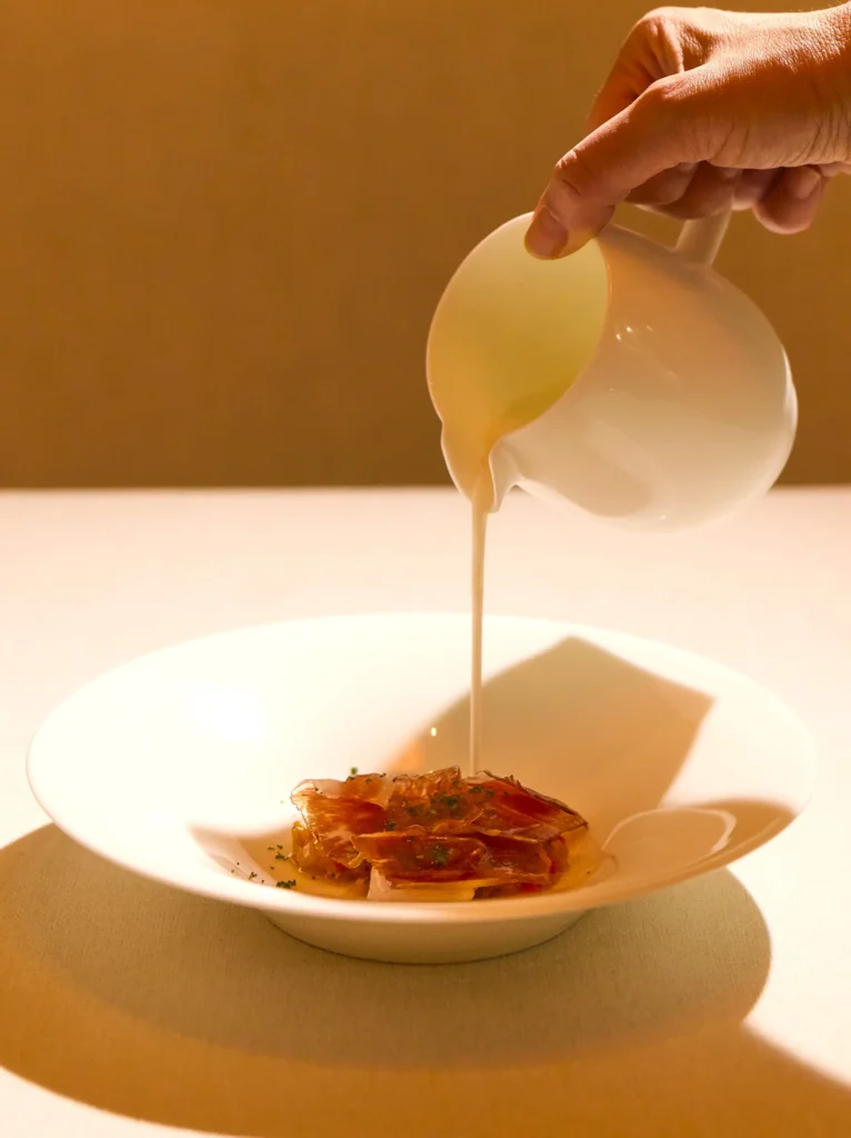 Blázquez iberico acorn ham with quail eggs, pisto and cold onion soup